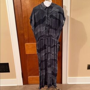 Black and Gray Patterned Button-Front Jumpsuit with pockets from Anthropologie.